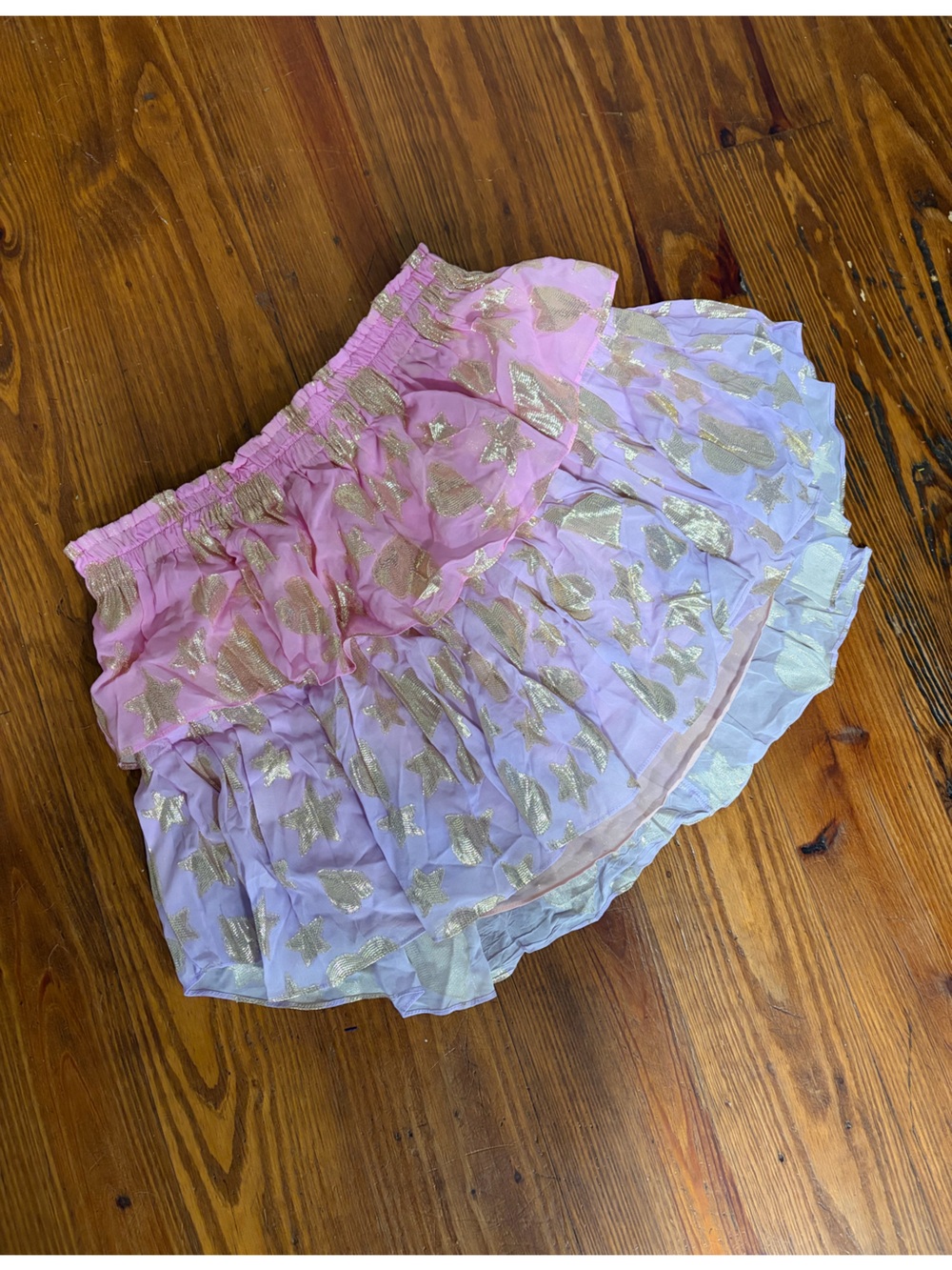 LoveShackFancy tiered ruffle skirt with gold bears and stars